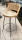 Hire BAR STOOL TALL THIN BLK METAL LEGS ROUND WICKER SEAT AND RAISED BACK.