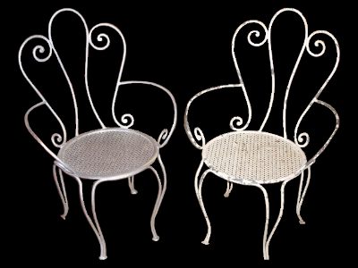 GARDEN CHAIR. THIN METAL SCROLL FRAME AND BACK.